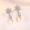 Japonés Corea del Sur hipster simple aretes de copo de nieve chapados en plata temperamento femenino moda aretes combinables joyería de oreja femenina al por mayor