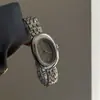 IEKE Reloj de Pulsera Metálico Estilo Frío Acero para Mujer Nicho Lujo Ligero Moda Alto Sentido Reloj de Mujer Reloj de Cuarzo Venta Caliente
