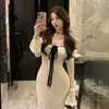 Design Puro Desejo Sexy Férias na Beira-Mar Vestido Branco de Uma Alça Manga Longa Cintura Feminina Emagrecimento Saia Longa que Molda o Quadril