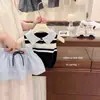 Conjunto de Verano para Bebé Niña 2026 Nuevo Estilo Chaleco de Punto sin Mangas con Cuello Polo a Cuadros Falda Conjunto de Dos Piezas para Niños