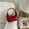 2026 Novo Modelo Bolsa de Ombro Meia-Lua, Bolsa de Mão de Couro Envernizado Colorido, Bolsa de Mão com Design de Nicho Fashion, Bolsa Pequena Tendência