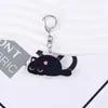 Llavero de acrílico de gato de dibujos animados, lindo colgante de gato negro, decoración de mochila, colgante transfronterizo, pequeño accesorio para llavero