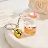 Chaveiro de Areia Líquida para Copo de Chá com Leite Gato da Sorte Criativo Pingente de Acrílico para Bolsas de Meninas e Chaveiros de Carro Pequeno Presente