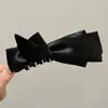 Pinza para el pelo de plátano con lunares estilo coreano para mujer, versátil y simple, nuevo modelo 2026, moderno y elegante, pinza para el pelo de alto valor estético