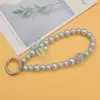 Cadena para teléfono con lazo estilo chica dulce y perla, con cierre de resorte, correa de muñeca desmontable, llavero para bolso, accesorio para funda de auriculares