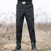 Pantalones de entrenamiento negros al por mayor de fábrica pantalones de entrenamiento de seguridad pantalones de camuflaje para exteriores pantalones tácticos pantalones de trabajo multibolsillo para hombre y mujer