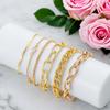 Pulsera de cadena en forma de O con giro creativo de estilo metálico exagerado para mujer, pulsera con diseño vintage de nicho que combina con todo.