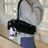 Bolso para la axila de diseño simple y nicho Nuevo bolso de mujer Verano 2025 Bolso de hombro versátil informal Bolso cruzado