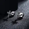 Aretes de espiral cruzada, aretes de moda para hombre de lujo ligero de alta gama, accesorios simples de moda hip-hop personalizados para mujer