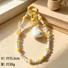 Colgante de pato de moda con lazo, cuentas de queso, llavero, correa para teléfono, accesorio para bolso, accesorio de bricolaje, regalo