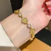 Pulsera de moda con flor de circonita chapada en oro real de 18k, pulsera vintage elegante y exquisita, joyería de lujo ligero de alta gama para mujer