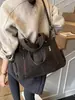 Bolsa de mão transfronteiriça 2026 nova moda outono/inverno bolsa tote para mulheres, grande capacidade, elegante, versátil, adequada para trabalho e deslocamento, bolsa de ombro