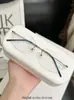 Nova armação de óculos sem aro estilo moderno em titânio puro com corte a laser, armação de óculos semi-titânio ultraleve popular, anti-luz azul, adequada para lentes de prescrição