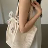 Bolsa de palha tecida para mulheres, grande capacidade, nova coleção primavera/verão 2026, design casual versátil, padrão vazado, bolsa de ombro, perfeita para férias na praia