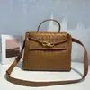 Bolso Tote de Cuero Genuino de Gran Capacidad Nuevo de Otoño Hebilla de Cuerda Metálica de Nicho Bolso Cruzado de Hombro Tejido para Mujer
