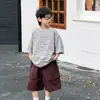 Loja de Algodão Roupas de Verão para Meninos Camiseta Infantil de Manga Curta 2026 Novo Estilo Coreano Respirável Listrada Graffiti Moda Infantil