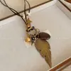 Nuevo Collar de Pluma Zen de Bronce Estilo Chino para Mujer, Accesorio de Cadena Larga de Doble Capa Estilo Étnico Bohemio para Suéter