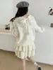 Conjunto de Suéter Estilo Suave Coleção Outono/Inverno 2026: Conjunto de Duas Peças: Cardigã de Tricô com Laço nas Costas + Saia para Mulheres