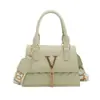 Bolsa de nicho com design francês moda feminina ins bolsa de mão texturizada da moda bolsa transversal de cor sólida com franja