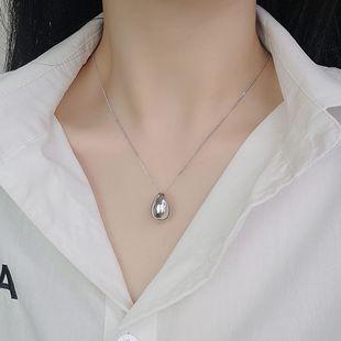 Collar largo con colgante de huevo de paloma en plata de ley s925, estilo nicho, cadena de suéter de alta gama de moda, cadena lateral con gotas de agua tridimensionales.