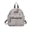 Nuevo Estilo Galleta Guiñando Colgante de Felpa Oscilante Encanto para Bolsos Lindo Accesorio para Mochila Llavero Colgante Pequeño