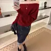 Roupas femininas de Dongdaemun, Coreia do Sul: top de malha de alta qualidade com mangas morcego, detalhe de corrente horizontal e padrão trançado