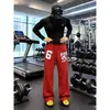 Pantalones de chándal anchos estampados casuales estilo coreano de hip-hop americano para mujer, otoño, corte holgado, pantalones de pierna curva para danza jazz