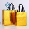 En stock Bolsa No Tejida Transfronteriza Impresible Ecológica Película Láser Papel de Aluminio Compras Ropa Publicidad Bolsa de Regalo Portátil