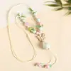 Collar con colgante de campana de mariposa de cerámica de estilo étnico retro para mujer, diseño nuevo y moderno, cadena larga para suéter, accesorios