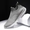 Sapatos Masculinos Transfronteiriços Primavera e Verão 2022 Slip-on Tênis Tecido Flyknit Masculino Esportivo Casual Tamanho Grande 46 Tamanho Sapatos Meia Elástica Masculino