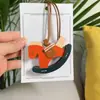 Nuevo Colgante Caballo Mecedora Lindo Decorativo Caballo de Madera PU Colgante para Bolso de Mujer Colgante para Llavero de Coche Accesorios