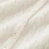 Bai Cai Rong colección nueva 2026: suéter de cachemira para mujer con diseño de cuello en V semiabierto, caracterizado por un patrón de punto trenzado, un corte ajustado y un estilo versátil, suave y cómodo