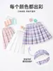Saias Curtas para Meninas 2026 Novas Saias de Verão para Crianças Saias Plissadas Anti-Exposição Roupas de Verão Saias de Estilo Preppy para Meninas