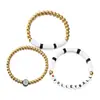 Novo conjunto de pulseiras de argila macia multicamadas transfronteiriço europeu e americano de 3 peças, joia souvenir versátil e da moda para o dia a dia