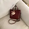 Bolso de Cubo de Estilo Coreano de Nicho Transfronterizo para Mujer Primavera 2026 Nuevo Bolso de Hombro Cruzado Casual Elegante de Gama Alta