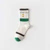 Calcetines de algodón para mujer de otoño e invierno de 168 pines con letras N cara sonriente calcetines para mujer desodorantes absorbentes de sudor calcetines cortos suelas elásticas de moda