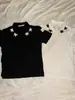 2026 Moda Callejera Nuevas Llegadas Unisex Camiseta Pulóver con Cuello Polo y Botones con Decoración de Estrella Estilo Americano Tendencia Ropa Ins
