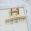 Pinza de pelo de metal estilo minimalista con forma de garra, accesorio para el cabello pequeño y mediano, adorno para el pelo coreano para la parte trasera de la cabeza con un toque de alta gama