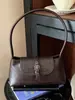 Bolsa baguette de nicho super popular para outono e inverno, novo estilo 2026 para mulheres, bolsa de ombro única/sob o braço da moda para o trabalho, bolsa de mão para atividades ao ar livre