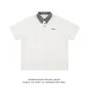 Camiseta de Manga Corta a Cuadros Contrastantes Estilo Coreano Patchwork para Hombre Verano 2025 Nuevo Retro Holgada Aspecto Adelgazante Top con Cuello Polo