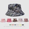 Sombrero de pescador de doble cara transfronterizo de Amazon Flor japonesa Calle coreana Estampado bronceado Sombrero de cubeta hip-hop Sombrero para el sol