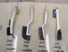 Escova de plástico para atacado, escova doméstica dupla face para remoção de poeira, artefato multifuncional para varrer cama, roupas, sofá, sapatos, escova de limpeza