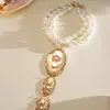 Collar de perlas en capas con cuentas transfronterizo europeo y americano, cadena para la clavícula estilo fiesta vintage, lujo ligero, accesorio versátil de alta gama para mujer