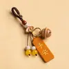 Chaveiro de Carro Sino de Mogno Criativo Pingente de Corpo para Homens e Mulheres Personalidade Bolsa de Segurança Pingente de Celular