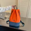 Mochila esportiva estilo coreano, corte relaxed, com blocos de cor, uma opção versátil e casual para casais, perfeita para atividades ao ar livre, trilhas e acampamento; uma mochila leve
