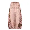 Comercio transfronterizo empalmado explosivo explosivo temporada de dulces retro cordón pantalones casuales pareja adelgazante vintage americano suelto estampado de leopardo ancho