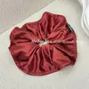Goma para el pelo fruncida de estilo coreano con borde prensado Simple Elegante Versátil para Mujer con Flor de Pelo Brillante de Gama Alta Moda Goma para Coleta