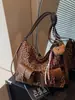 Bolso Tote de Gran Capacidad Transfronterizo para Mujer Otoño e Invierno 2026 Nuevo Mochila Retro con Estampado de Leopardo Bolso de Hombro de Gama Alta