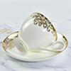 Juego de taza y platillo de café de porcelana china al por mayor de fábrica, taza de té de cerámica dorada para recepción de oficina europea americana