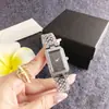 Reloj de pulsera para mujer de cuarzo, banda de acero rectangular con incrustaciones de diamantes, esfera blanca, reloj de pulsera para mujer, reloj de cuarzo al por mayor
